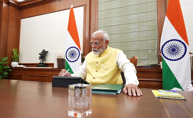 PM Narendra Modi signs his first file authorising the release of the 17th instalment of PM Kisan Nidhi